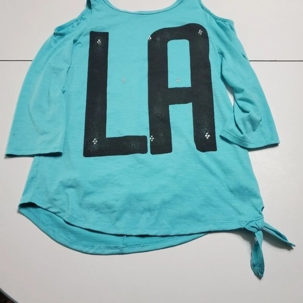 Justice size 10 bedazzled sleeve LA blue shirt